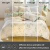A bed dressed with an elegant floral duvet cover in white and green tones, displayed under dim, warm, cold, and natural light