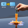 A hand holds a syringe applicator used to apply a DIY windshield repair kit onto a surface.