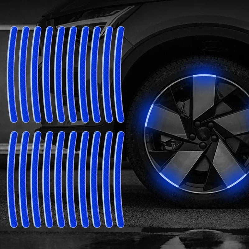 Blue reflective strips installed on a car wheel rim for enhanced visibility.