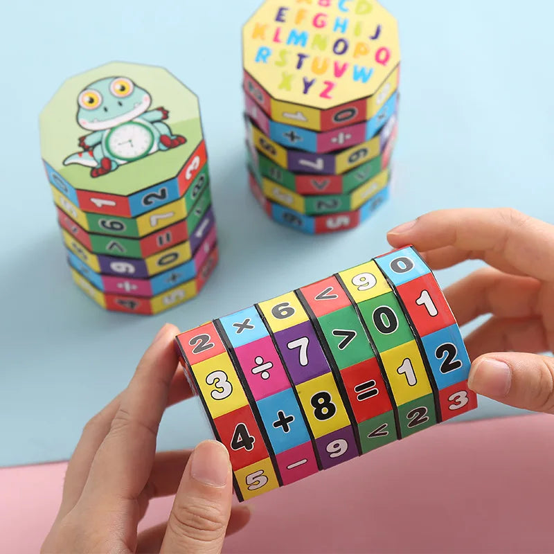A hand holds a stack of colorful Montessori math cubes featuring numbers and arithmetic operations for learning.