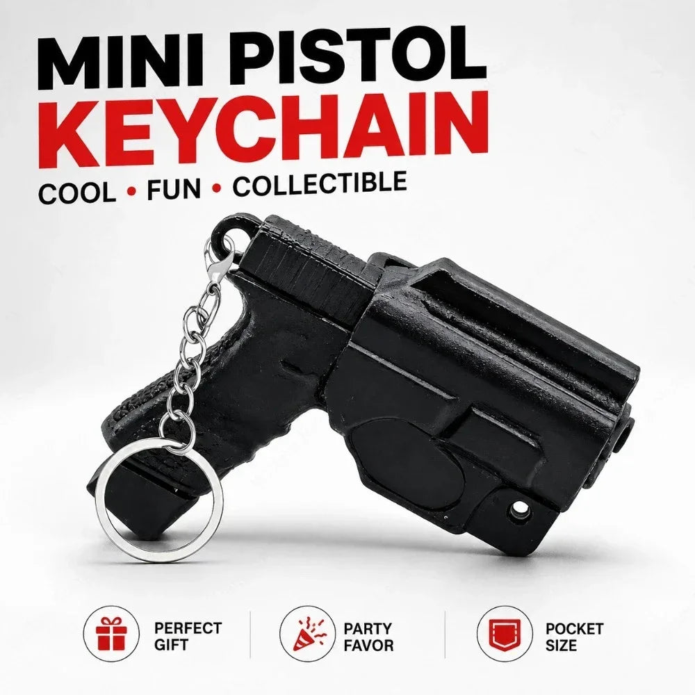 Black mini pistol keychain accessory with a silver chain, shown against a white background.