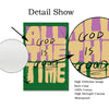 Detail show of a canvas print featuring the text God Is Good All The Time in yellow and purple tones.