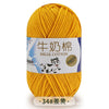 A ball of yellow milk cotton blend yarn labeled for knitting and crochet projects.