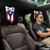 Two black car headrest covers featuring a patriotic design are visible in the interior of a vehicle.