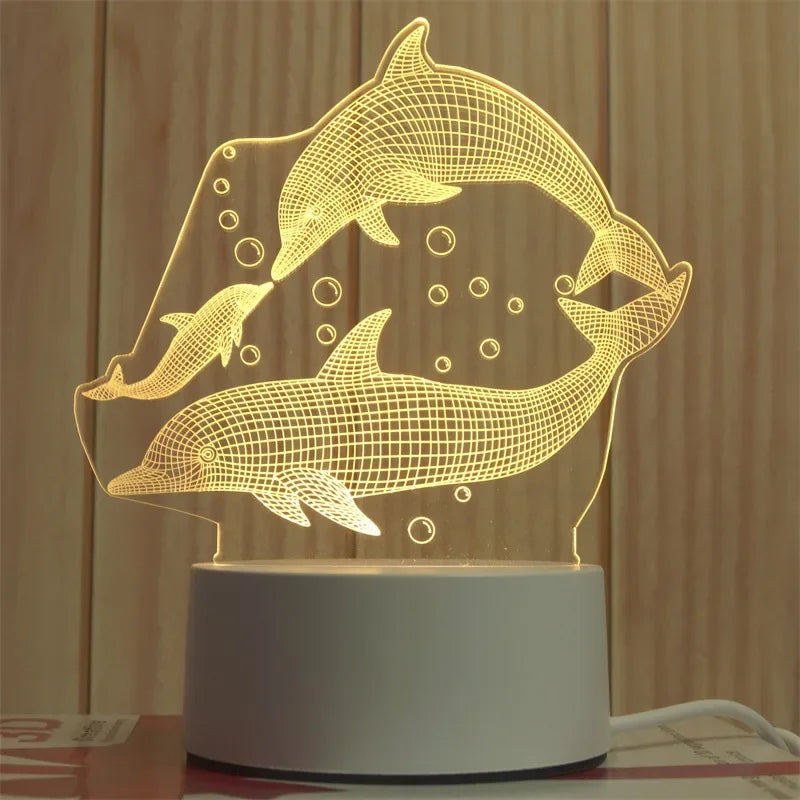 A glowing wireframe whale silhouette night light lamp illuminating a wooden background.