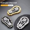 A set of chain gear snails or fidget spinners made of metal alloy for finger training and stress relief.