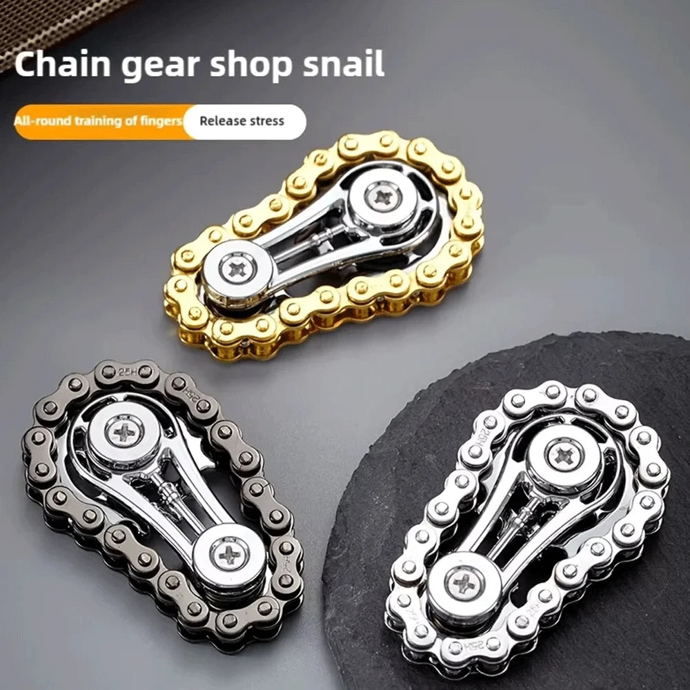 A set of chain gear snails or fidget spinners made of metal alloy for finger training and stress relief.