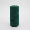 A spool of dark green macrame cord, 3mm/4mm thickness, used for crafting.