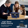 A man and two girls are using a blue stand for an iPad with a built-in case and pencil holder on a wooden table.