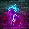 A neon silhouette of a person in pink and blue outlines against a dark brick wall.