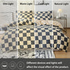 A checkered print bedding set featuring a duvet cover and pillowcases displayed with various light colors.