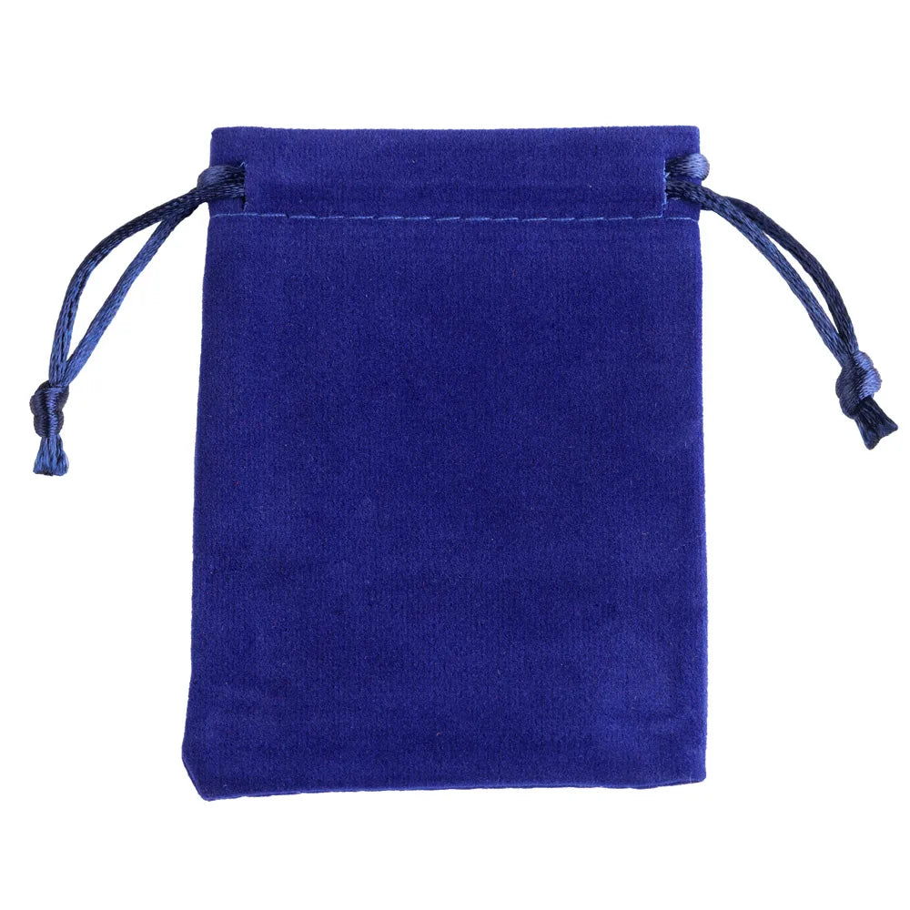 A deep blue velvet drawstring jewelry pouch with frayed edges and tied fabric loops.