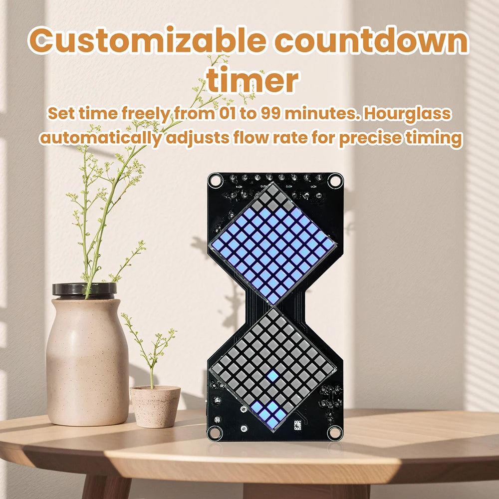 A customizable countdown timer made of an LED matrix hourglass device resting on a wooden table.