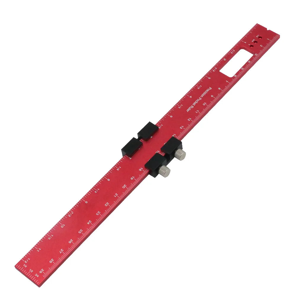 Red aluminum pocket ruler with a T-track slide stop and a rectangular plastic holder.