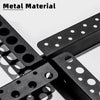 A close-up view of a black metal material tool storage rack with multiple circular holes.