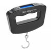 Black portable digital luggage scale with a backlit display and a metal hook.