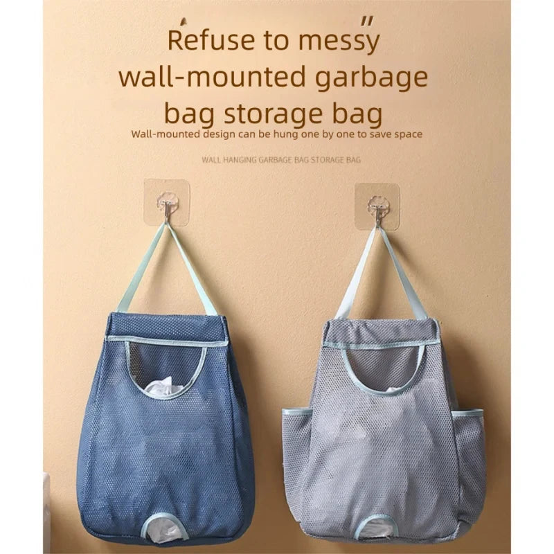 Two wall-mounted fabric garbage bags in blue and gray hanging on a beige wall.