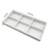White plastic drawer organizer tray with compartments measuring 9.5cm by 19.5cm and 2cm deep.
