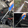 A blue pneumatic high-pressure water gun is shown being used on a car engine component.