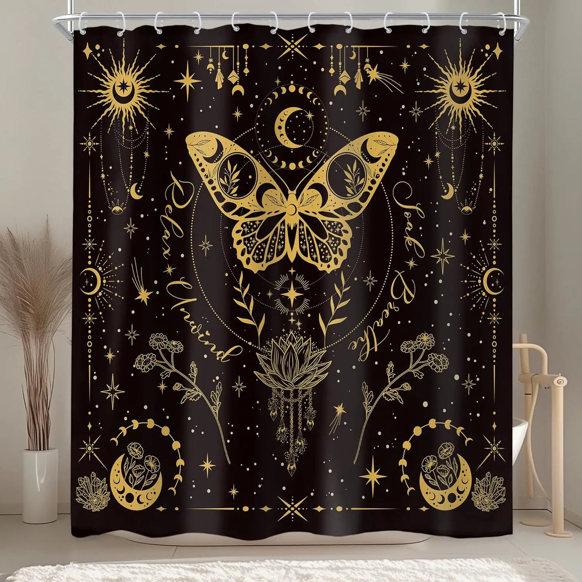 Black shower curtain featuring a gold gothic skull design with moth and floral patterns.