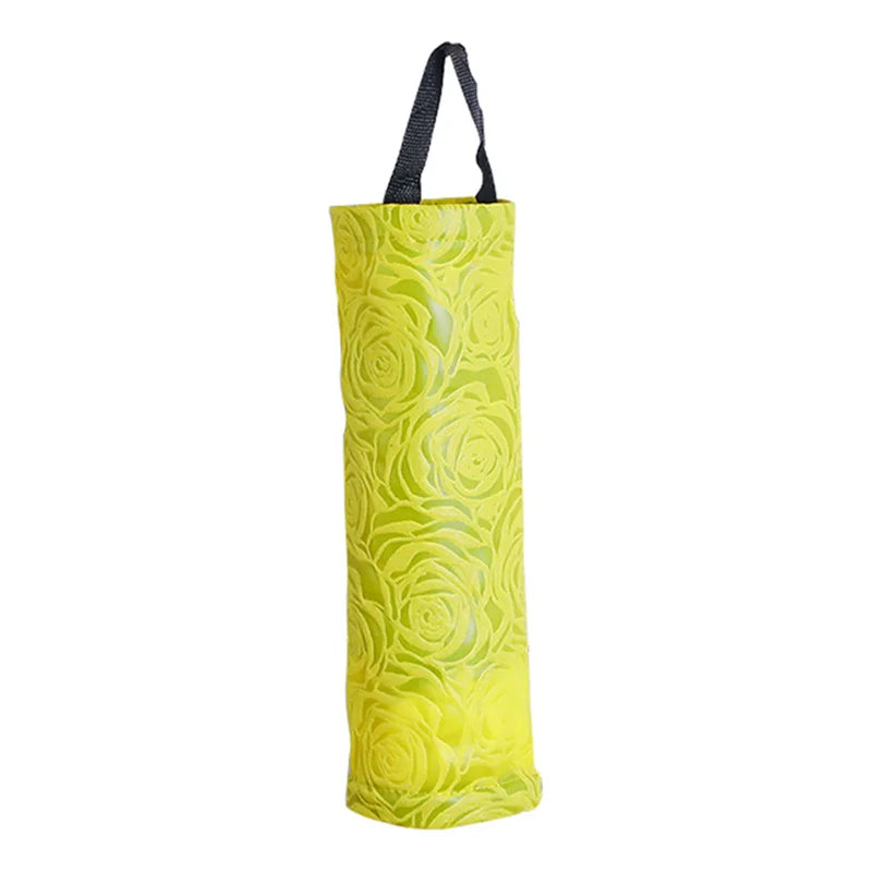 A yellow plastic bag dispenser with a black strap, featuring a pattern of embossed roses.