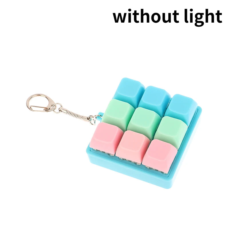 A set of light-up mechanical keychain fidget toys with custom colored keycaps.