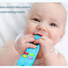 A baby is holding a blue silicone teether toy with a remote control shape to relieve dental discomfort.