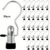 A set of 30 stainless steel clothespins with hooks for space-saving laundry drying, shown in various configurations.