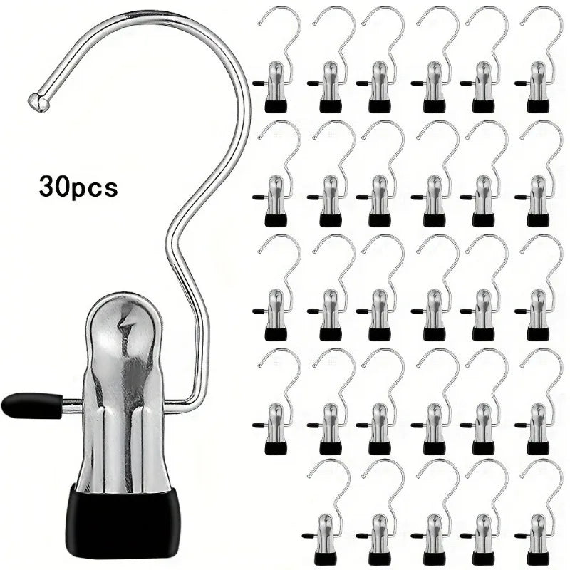 A set of 30 stainless steel clothespins with hooks for space-saving laundry drying, shown in various configurations.