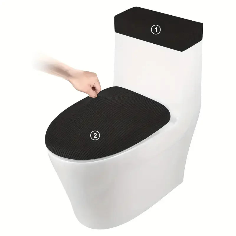A white toilet seat with a black lid cover and a black seat cover, showing the covers for the tank and seat.