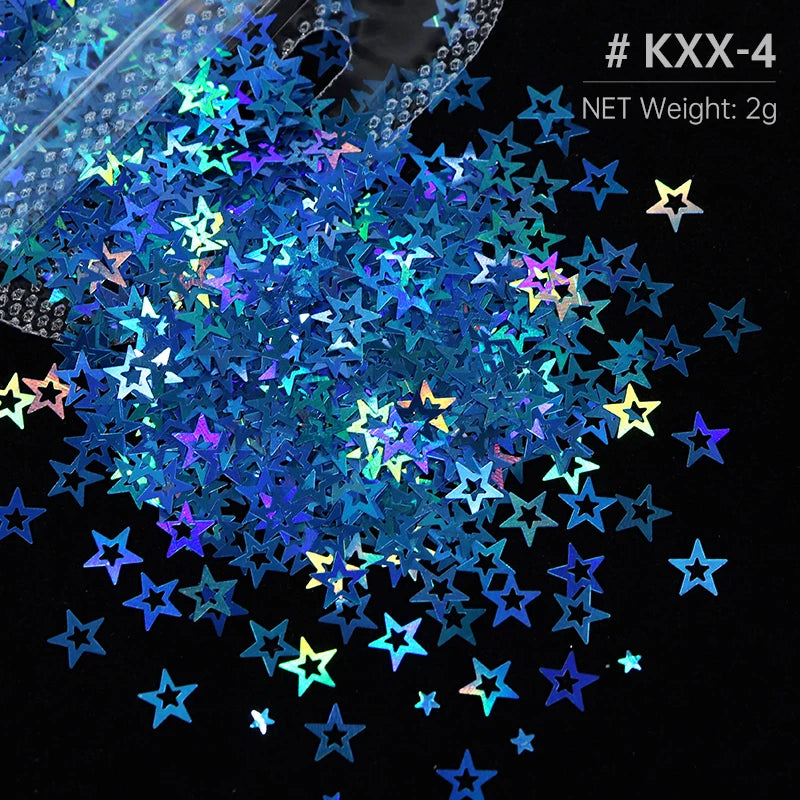 A close-up of iridescent blue and purple holographic star sequins scattered on a dark background.