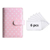 Pink polka dot PU leather binder wallet with cash envelopes and card holder shown next to a stack of six plastic cards