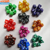 A set of seven polyhedral dice in various colors including green, yellow, black, and purple.