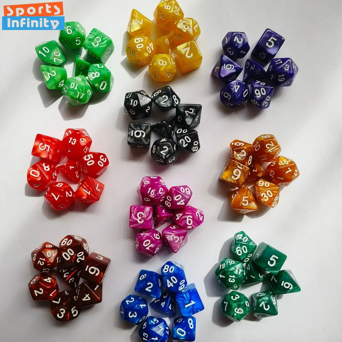 A set of seven polyhedral dice in various colors including green, yellow, black, and purple.