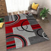 Abstract geometric anti-slip area rug featuring red, gray, and black circular and rectangular patterns.