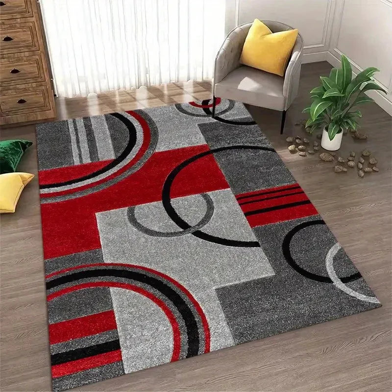 Abstract geometric anti-slip area rug featuring red, gray, and black circular and rectangular patterns.