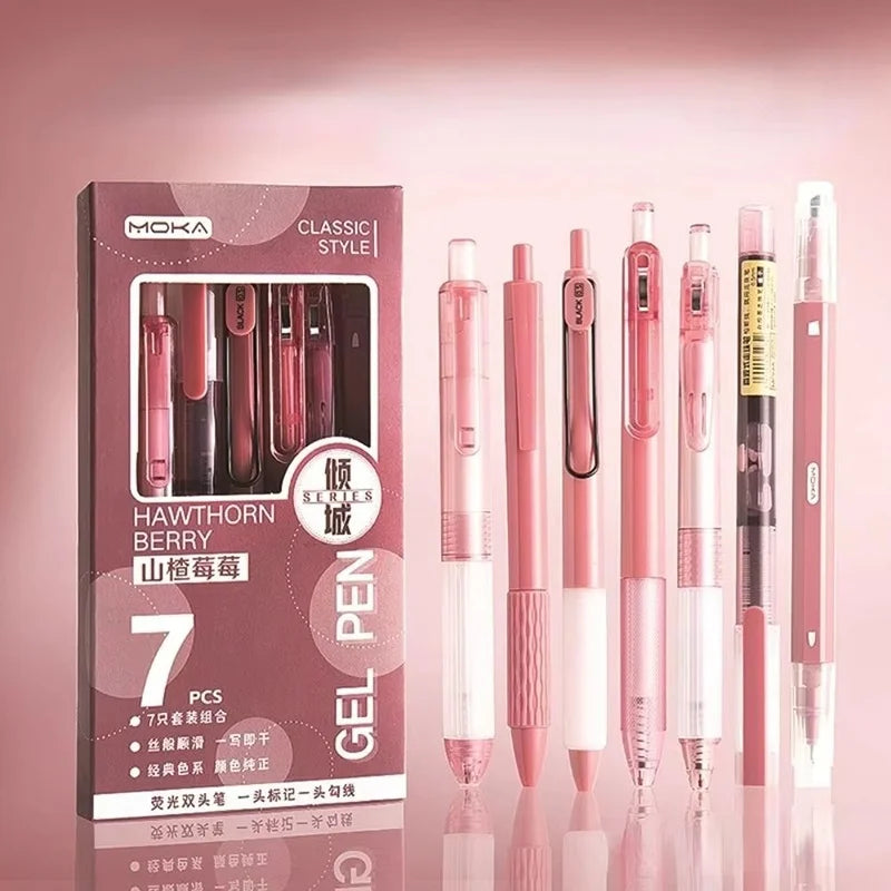 A pack of seven pink and black gel pens displayed in a cardboard box with a minimalist design.