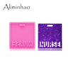 A pink silicone resin mold with the word NURSE molded into it, next to a purple glitter mold with the word NURSE.
