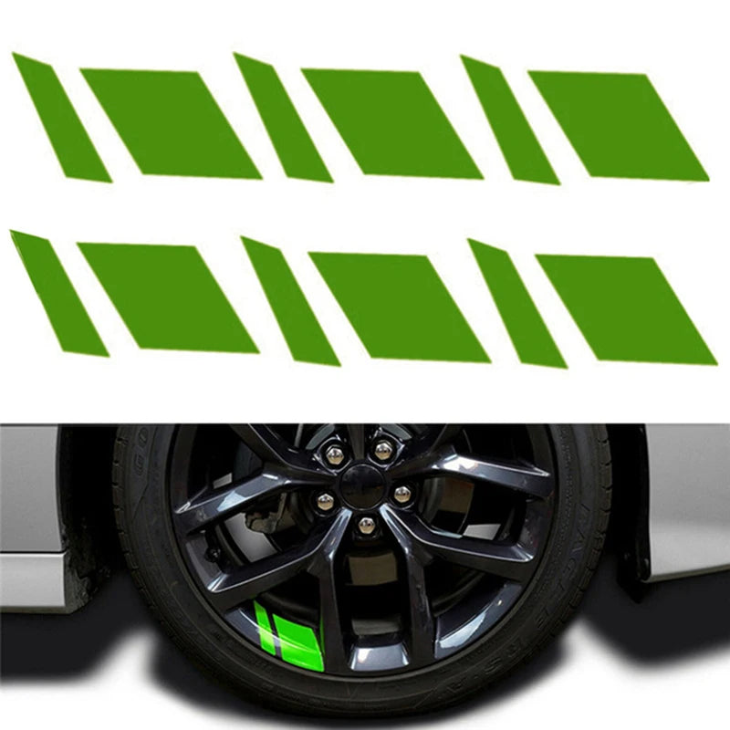 A set of six green reflective stickers designed for wheel hubs.