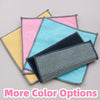 A stack of colorful double-sided non-scratch dishcloths featuring pink, yellow, and blue microfiber with a black mesh cloth.