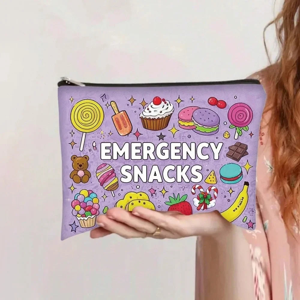 A purple canvas storage pouch filled with various emergency snacks like lollipops, cupcakes, and candies.