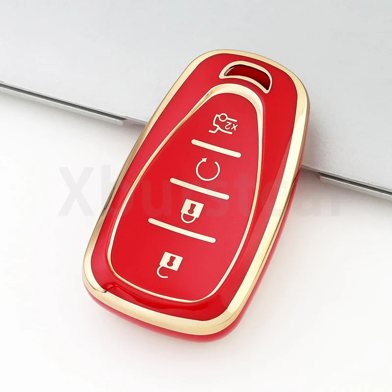 A red and gold durable TPU key fob cover for a Chevrolet vehicle.
