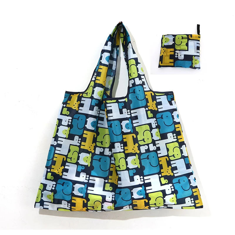 A reusable shopping tote bag featuring a pattern of stylized blue, yellow, and black animals.