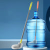 A blue plastic bucket is shown with a cleaning brush featuring a stainless steel handle and bristles.