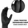 Close-up view of black disposable nitrile cleaning gloves showing the texture and grip.