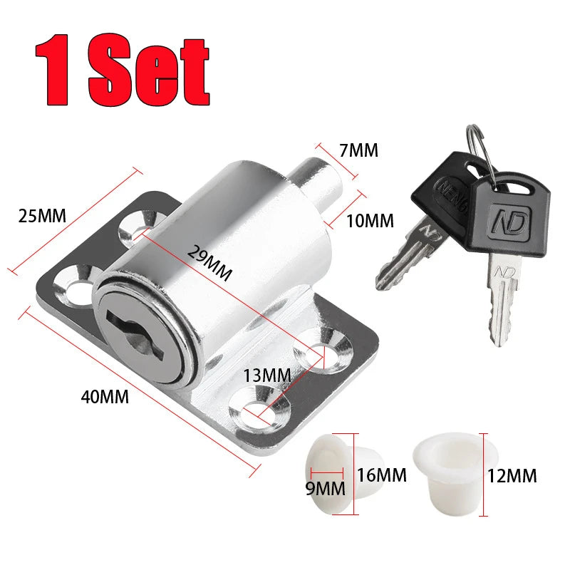 A silver sliding door window lock set includes a main lock and two keys, along with small white plastic components.