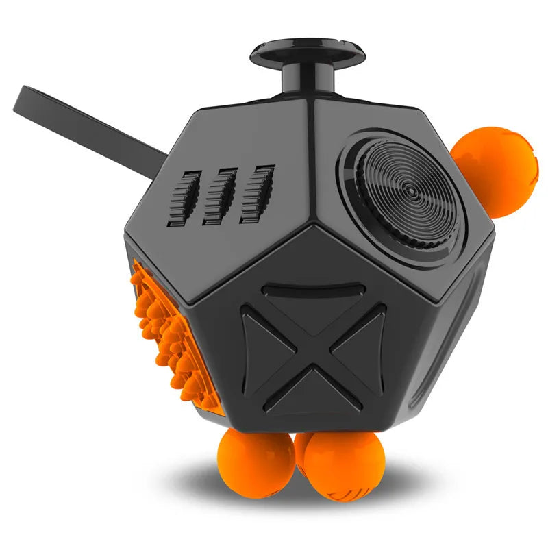 A black 12-sided fidget cube with orange accents and a sliding piece.