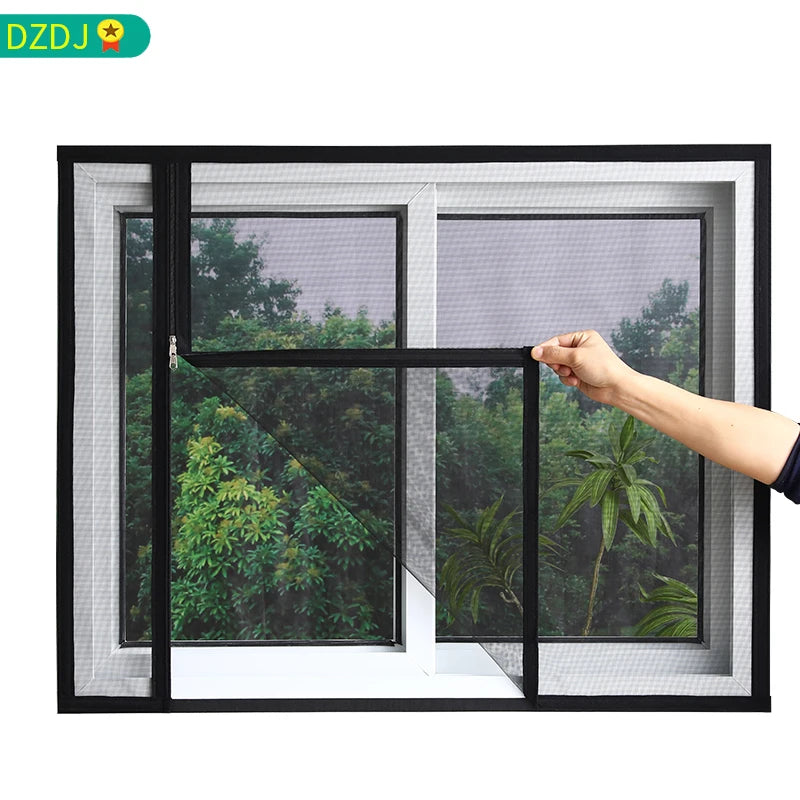 A hand is opening a window featuring a black frame and a mesh mosquito net screen on a glass window.