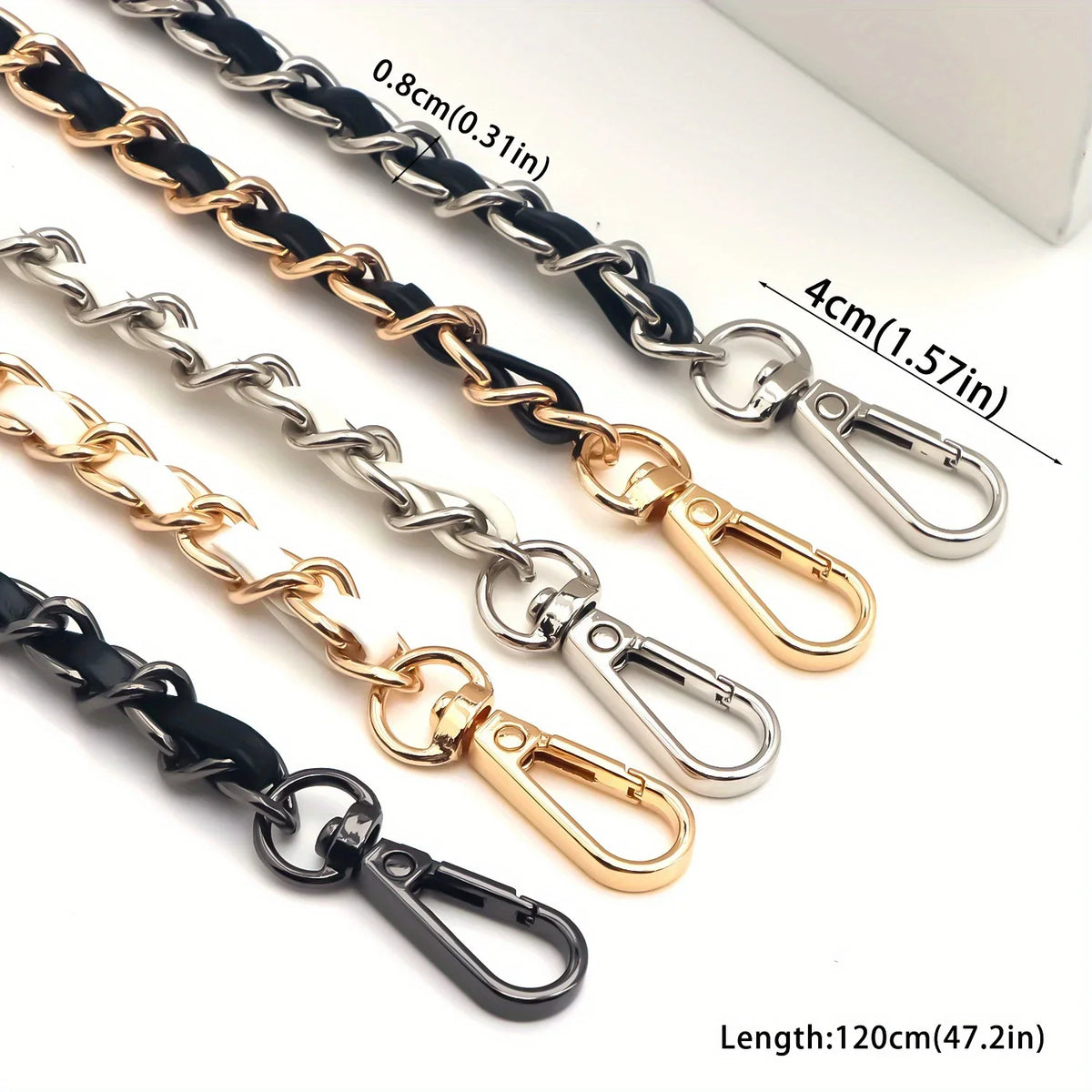 Multiple lengths of classic metal chain purse straps in black and gold finishes with secure buckles.