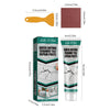 Tube of Jue-Fish quick drying ceramic tile repair paste with an orange applicator tool